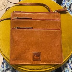Dooney & Bourke leather North South Triple Zip Crossbody.